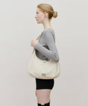 CLASSIC LOGO ROUND SHOULDER BAG IN LIGHT BEIGE image 7