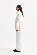 BACK LOGO HIGH NECK JUMPER IN CREAM image 20