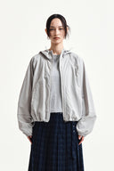 CROPPED BACK LOGO HOODY WIND BREAKER IN LIGHT BEIGE image 6
