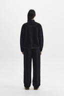 BOUCLE TEXTURE KNIT ZIP UP IN DARK NAVY