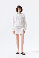 MESH LOGO WRAP MINI SKIRT IN WHITE image 8