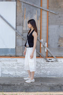 LAYERED BUTTON HALTER NECK TOP IN BLACK image 7