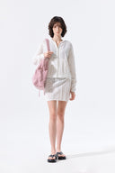 MESH LOGO WRAP MINI SKIRT IN WHITE image 9
