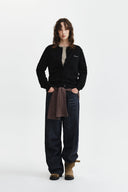 CASHMERE BLENDED CUTLINE ROUND CARDIGAN IN BLACK